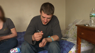 In last year’s “In the Shadow of Death: Jason’s Journey,” a multi-part “CBS Evening News” series, reporter DeMarco Morgan followed Jason Amaral on his path to recovery. Amaral was then a 30-year-old addict living in the Boston area. (CBS News)